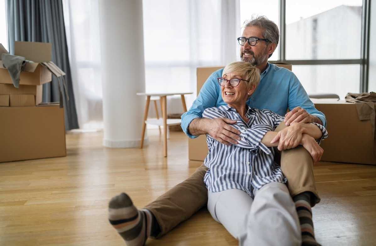 Senior couple happy about downsizing